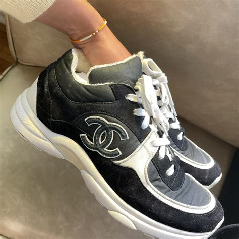 white and black chanel trainers